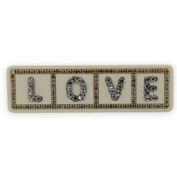 Barrette LOVE écru et strass